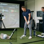 golfer-testing-golf-ball-compression-and-energy-transfer-in-fitting-bay